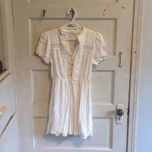 White light summer dress with cute stitching and tortoise shell buttons